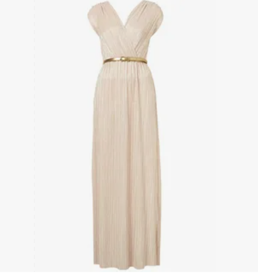 Wide Leg Pants Women Can Style With a Metallic Backpack